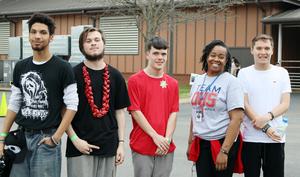 Students and teacher smiling