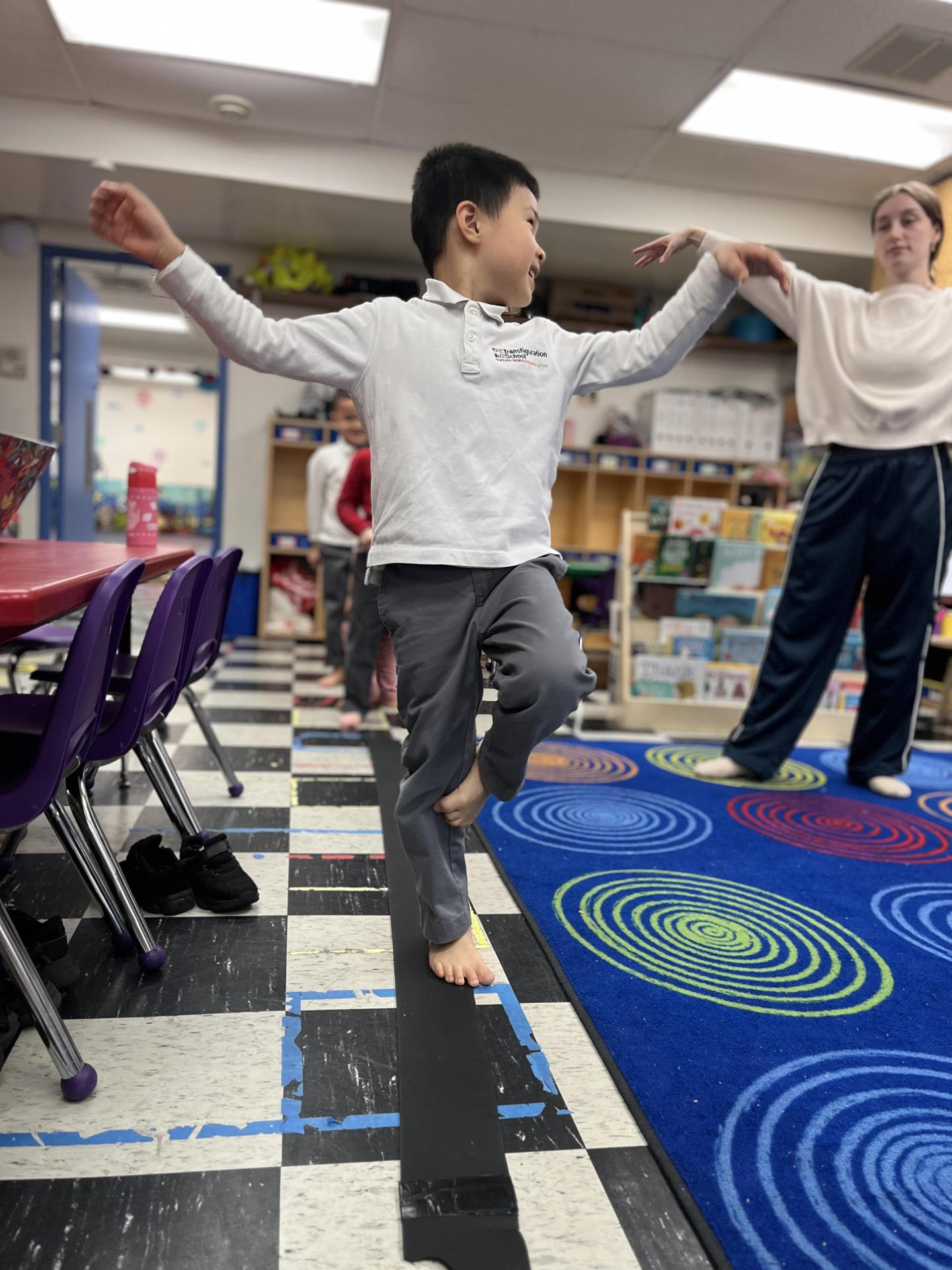 Child participating in KinderGym