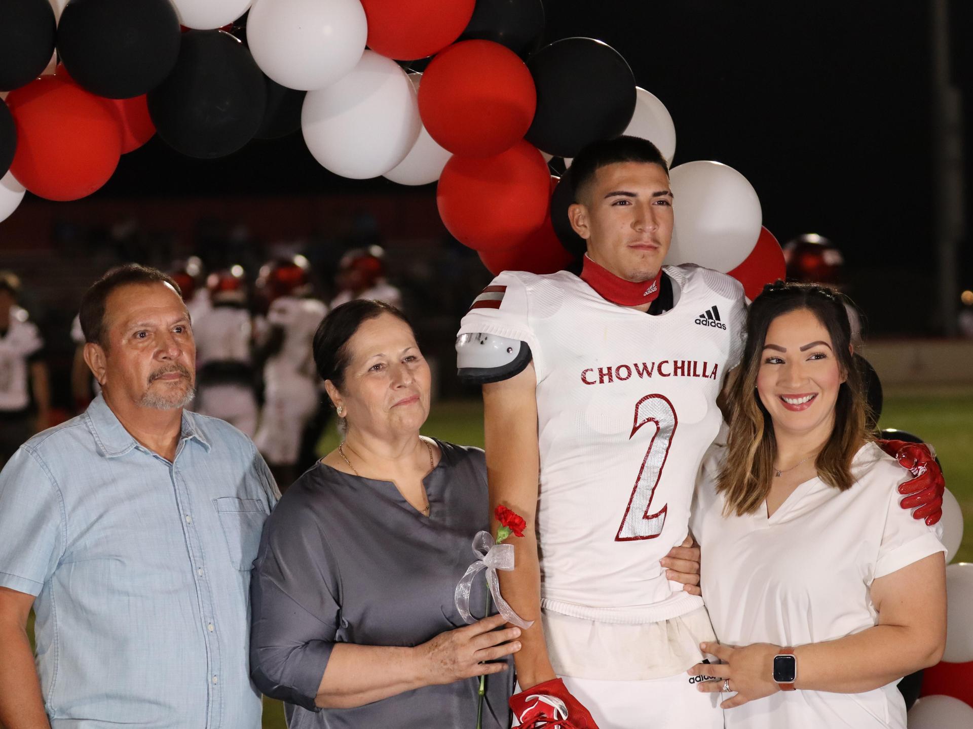 seniors and their escorts celebrating senior night