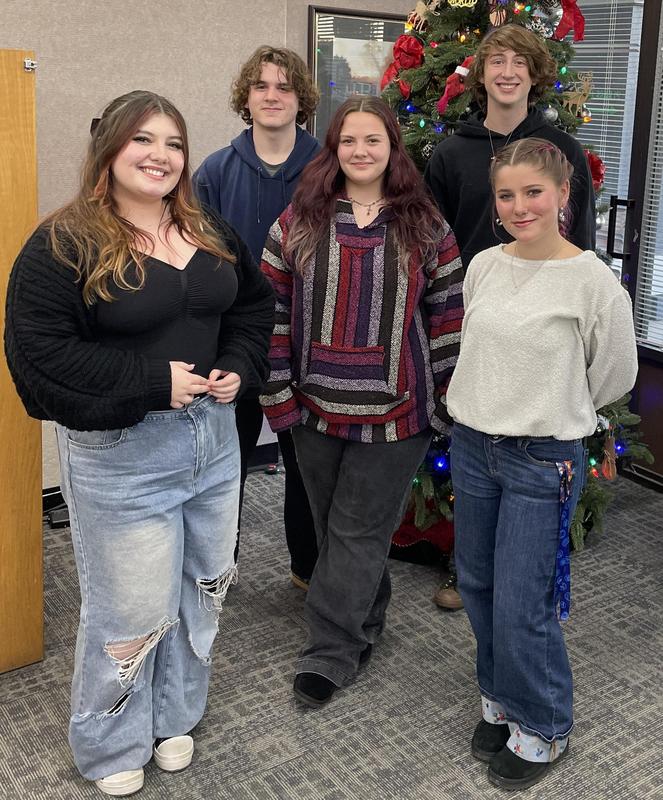 three young ladies and two young men