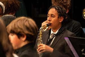 The 8th grade band performs