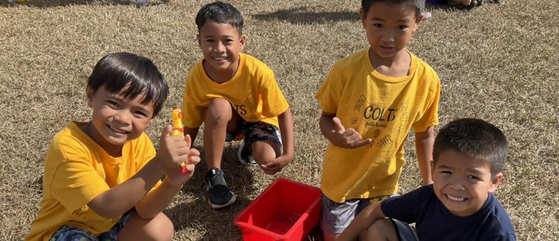 Students sorting balls and equipment at Field Day