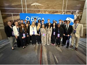 Smiling group of students, some with awards