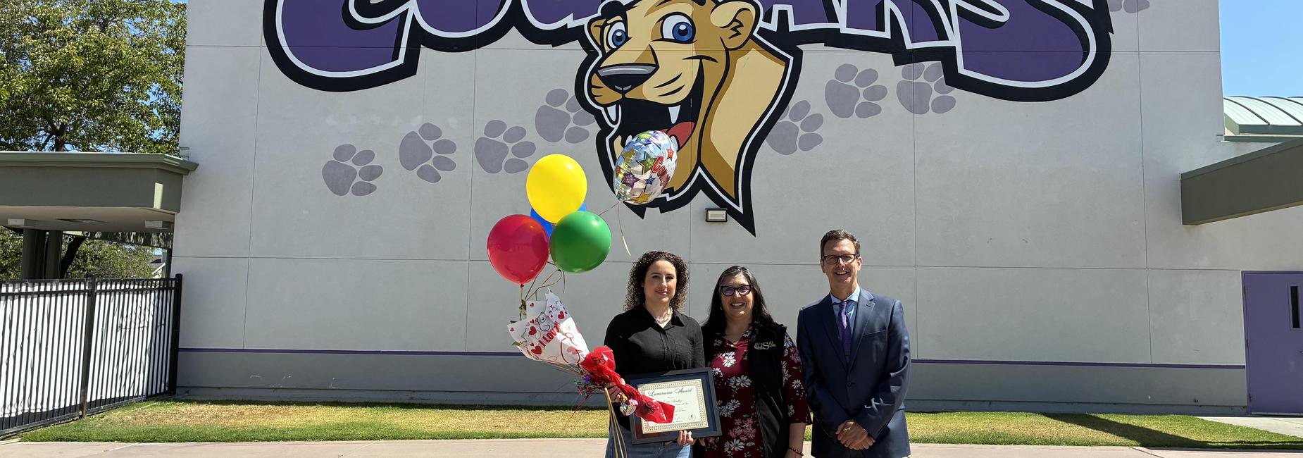Luminaria Award presented to Ms. Sandra, by Principal Mr. Franzell and our Superintendent, Ms. Anzo.