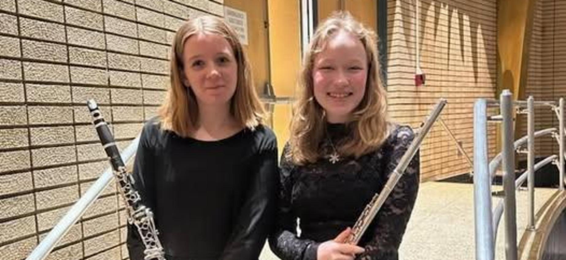 Jillian Boarts and Vivian Kennerdell proudly representing Leechburg at the Alle-Kiski Honors Band at Burrell