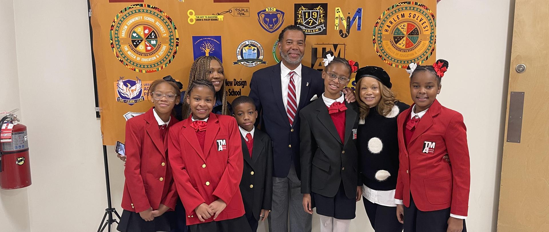 Students from TMALS with the superintendent and deputy superintendent