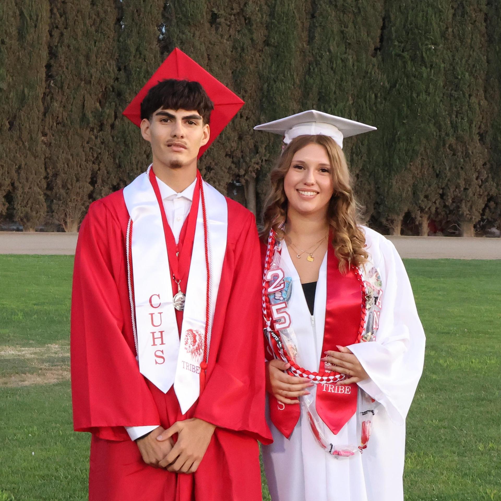 seniors posing together before walking in to graduation