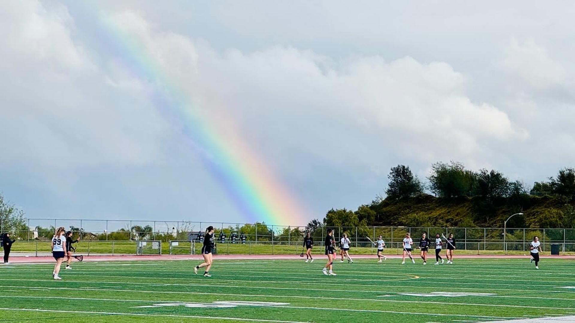 A rainbow over the field during a West Ranch Girls Lacrosse game.