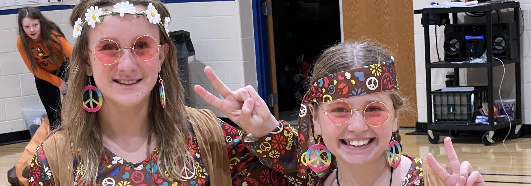 2 girls dressed as hippies for Halloween