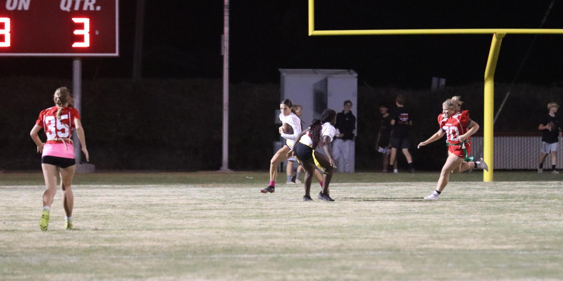 girls playing flag football