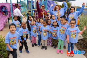 Children cheering for the new space