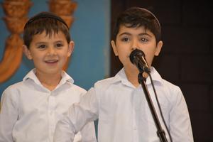 A first grader performs.