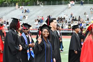 Graduate gives peace sign