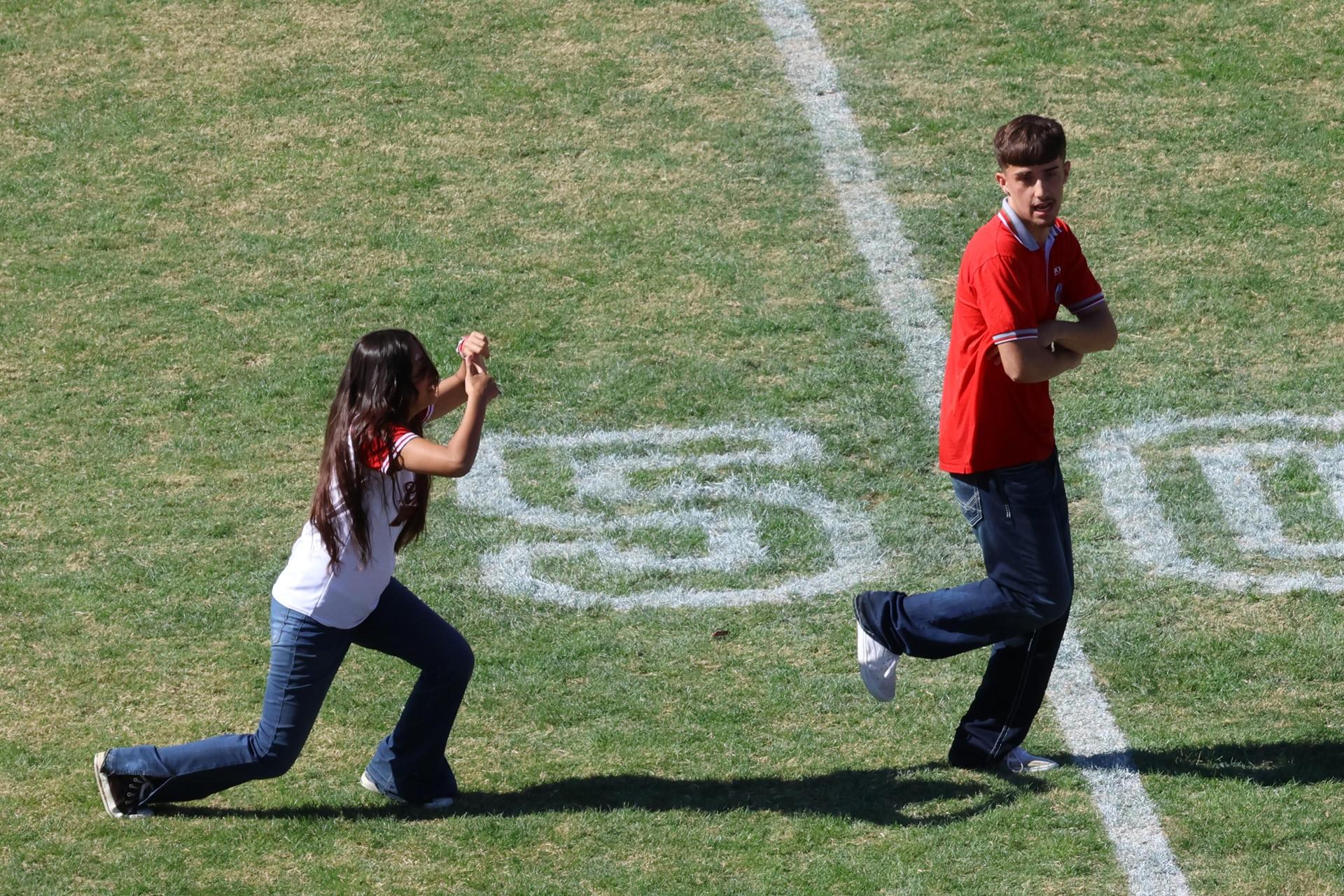 students and staff at the homecoming rally