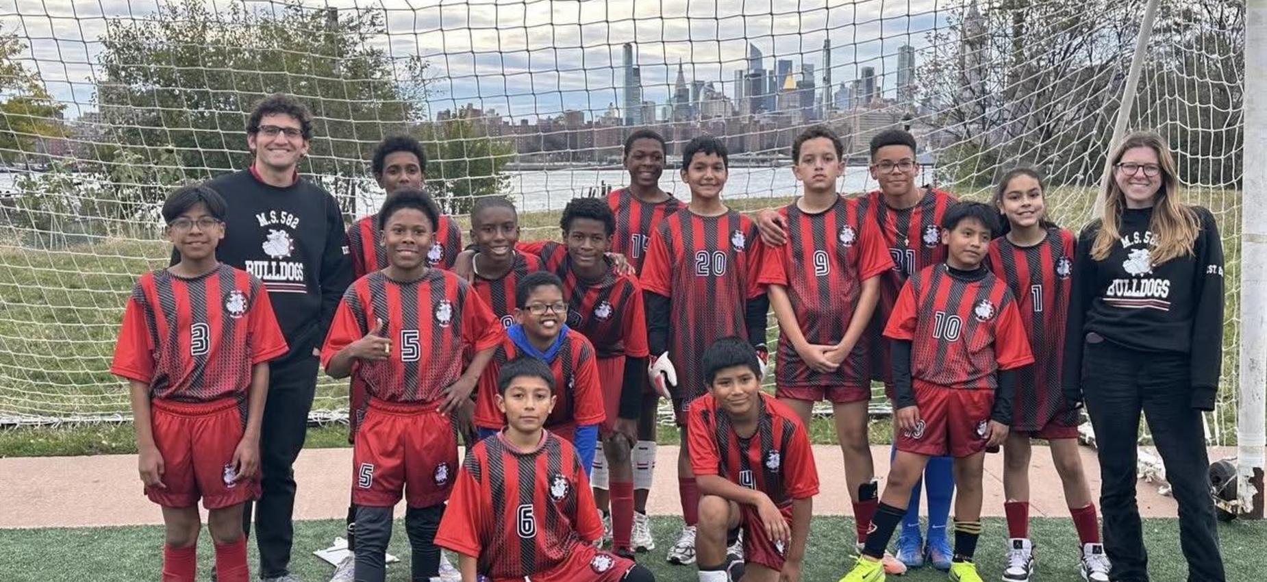 Coach Haley and Coach Mazurek with our Soccer team!