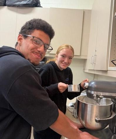 Students preparing cinnamon buns