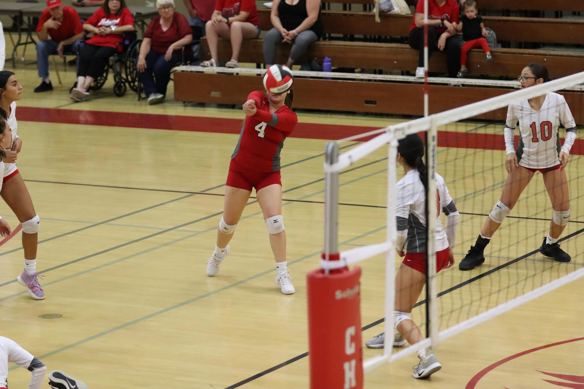 junior varsity girls playing volleyball against Liberty