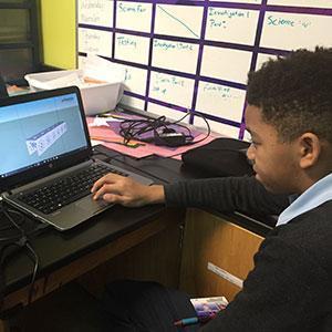 Students working on a science project outside