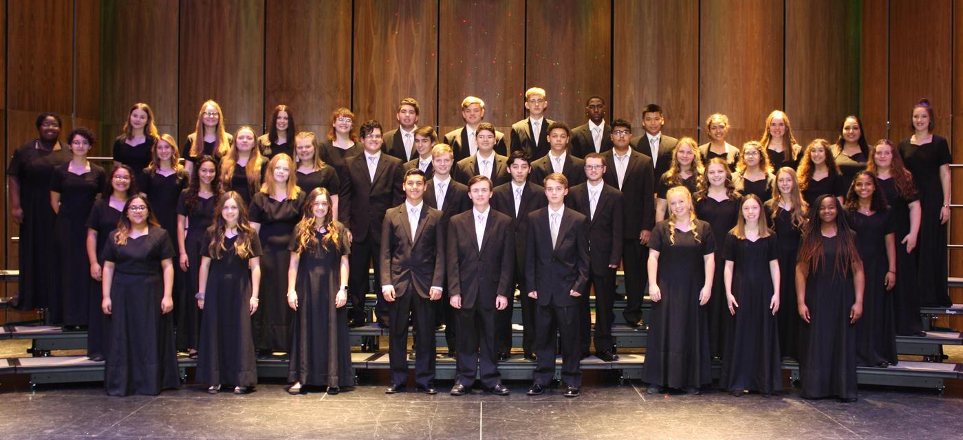 Varsity chorale group picture in formal attire
