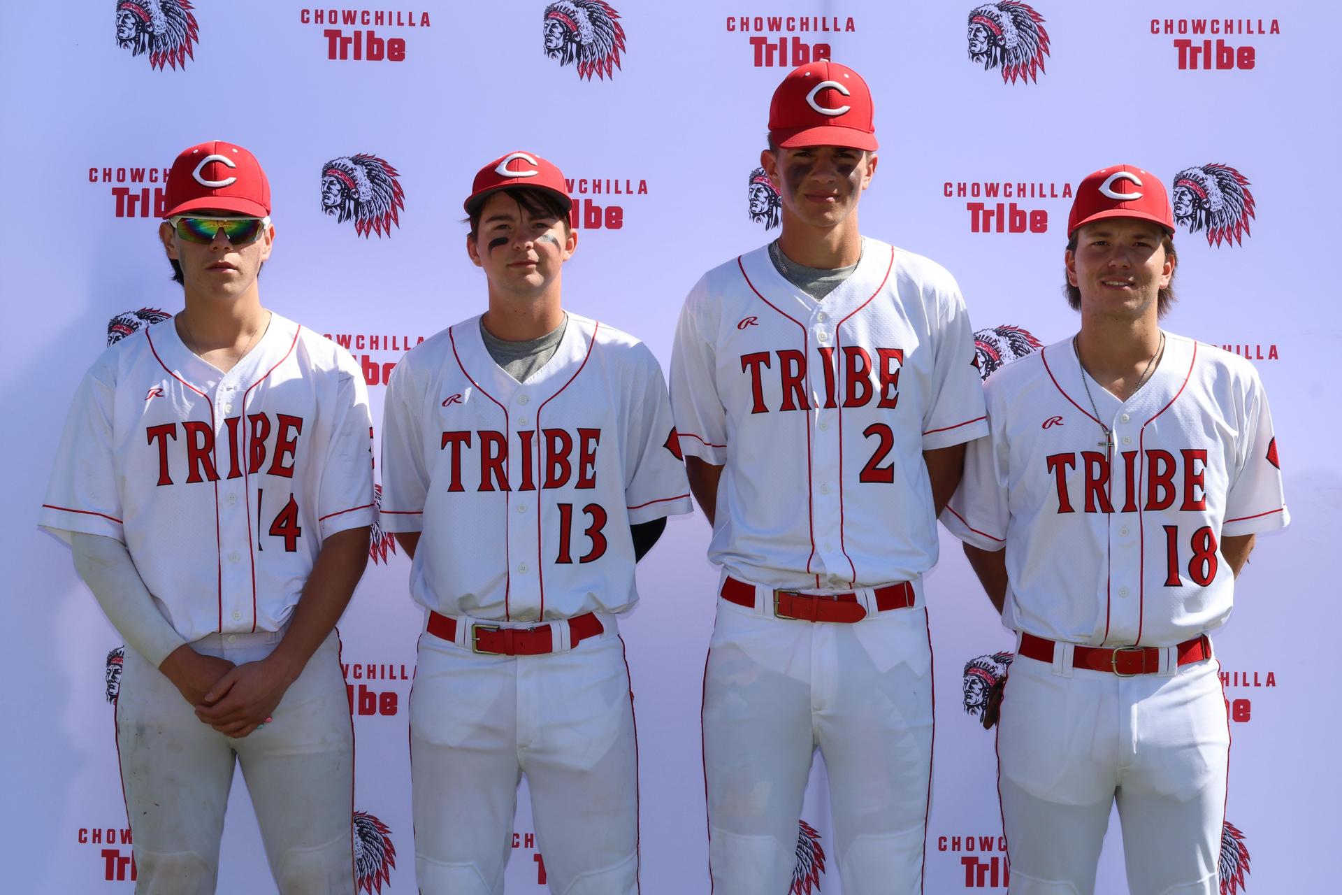 Seniors Posing With Teammates, Coaches, And Family
