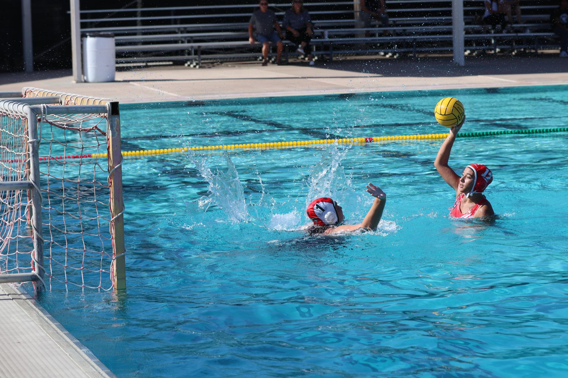 girls playing water polo against Hoover