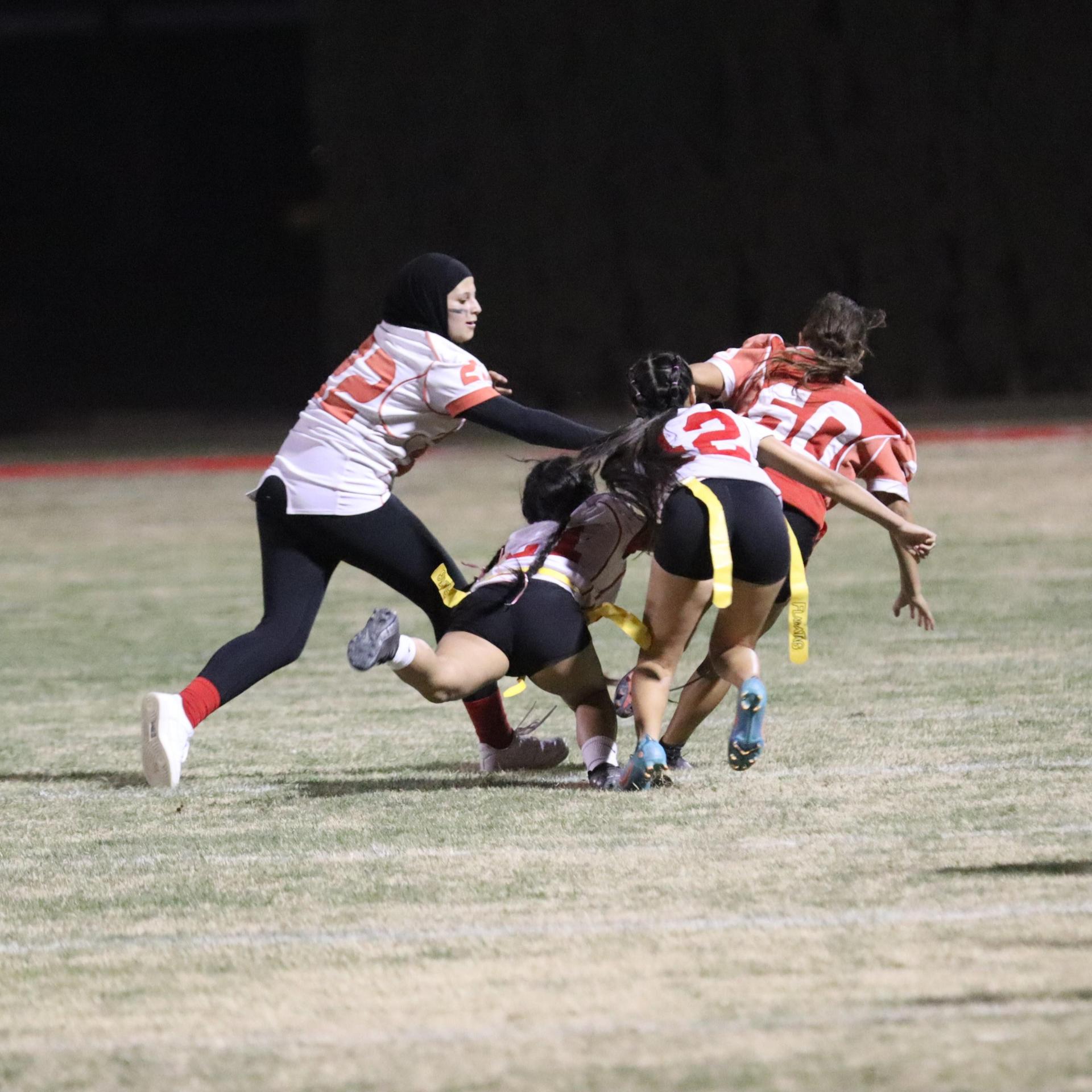 girls playing flag football