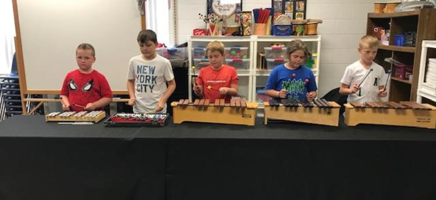 students practicing music