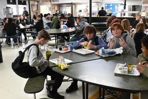Kids enjoying lunch.