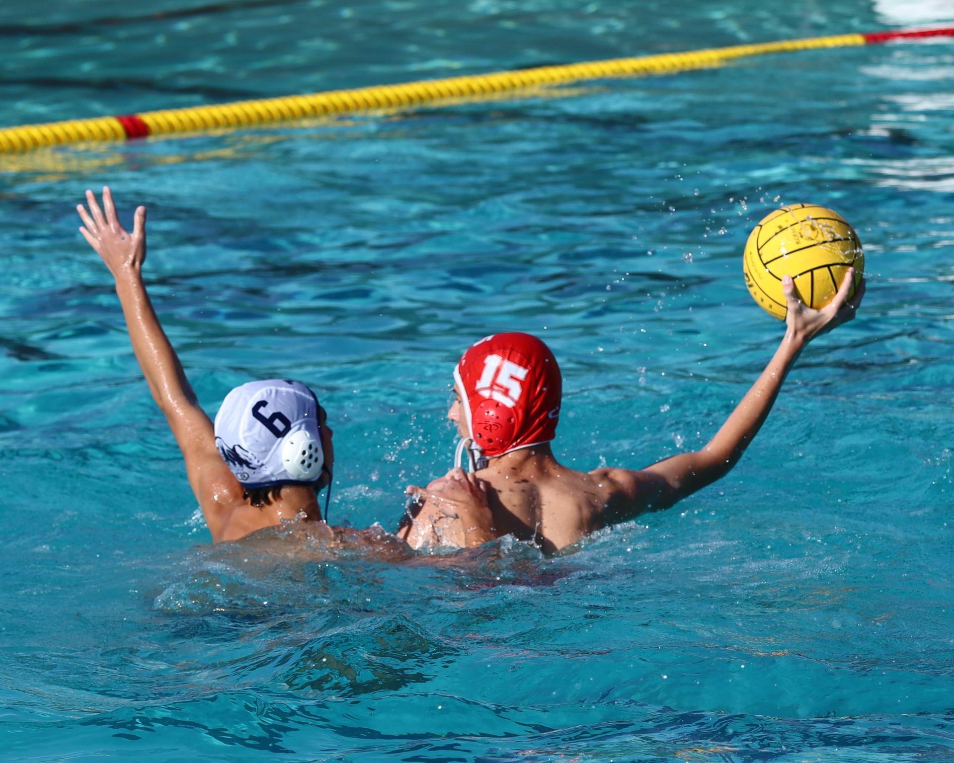 Boys playing water polo against Yosemite