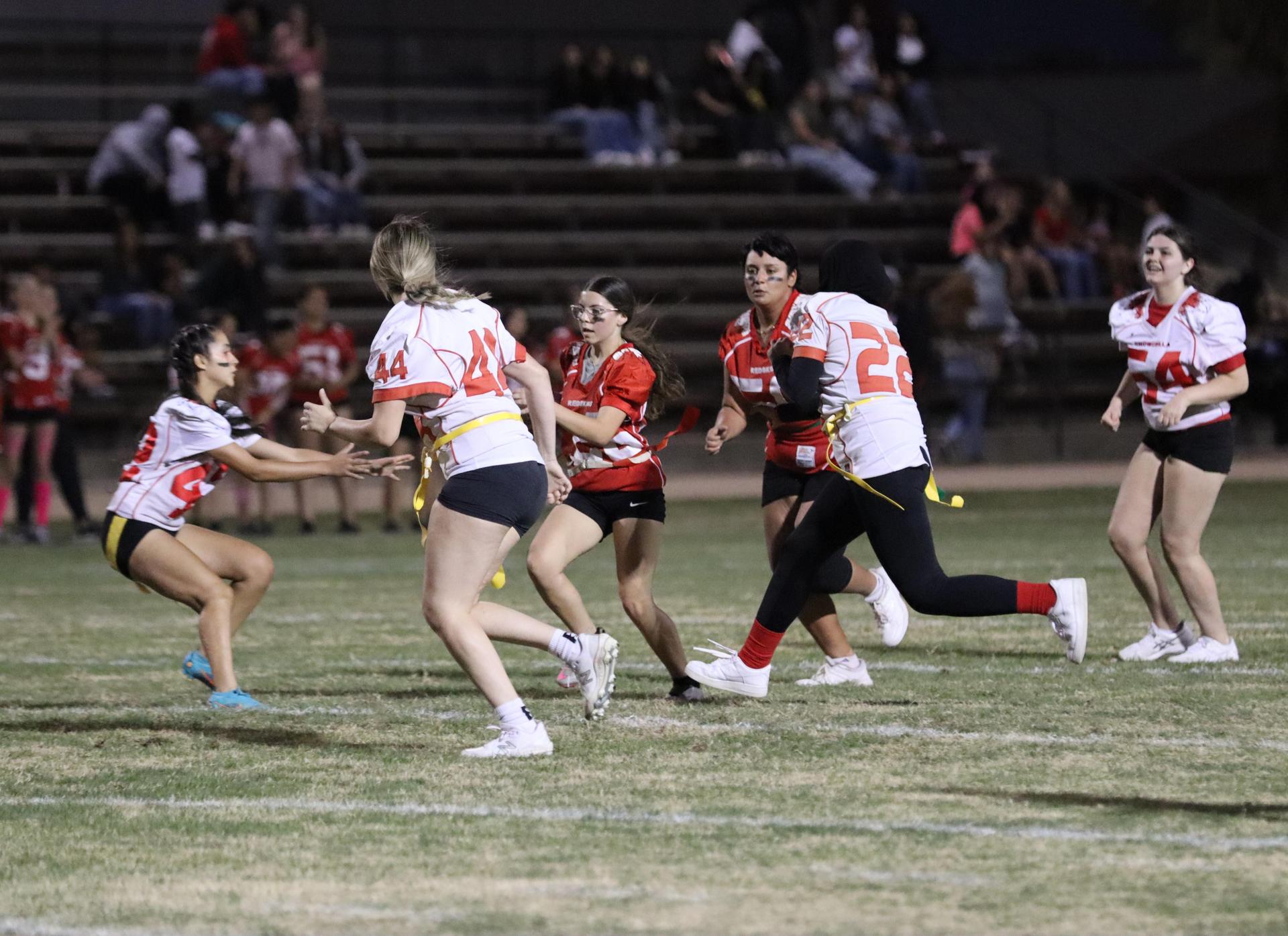 girls playing flag football