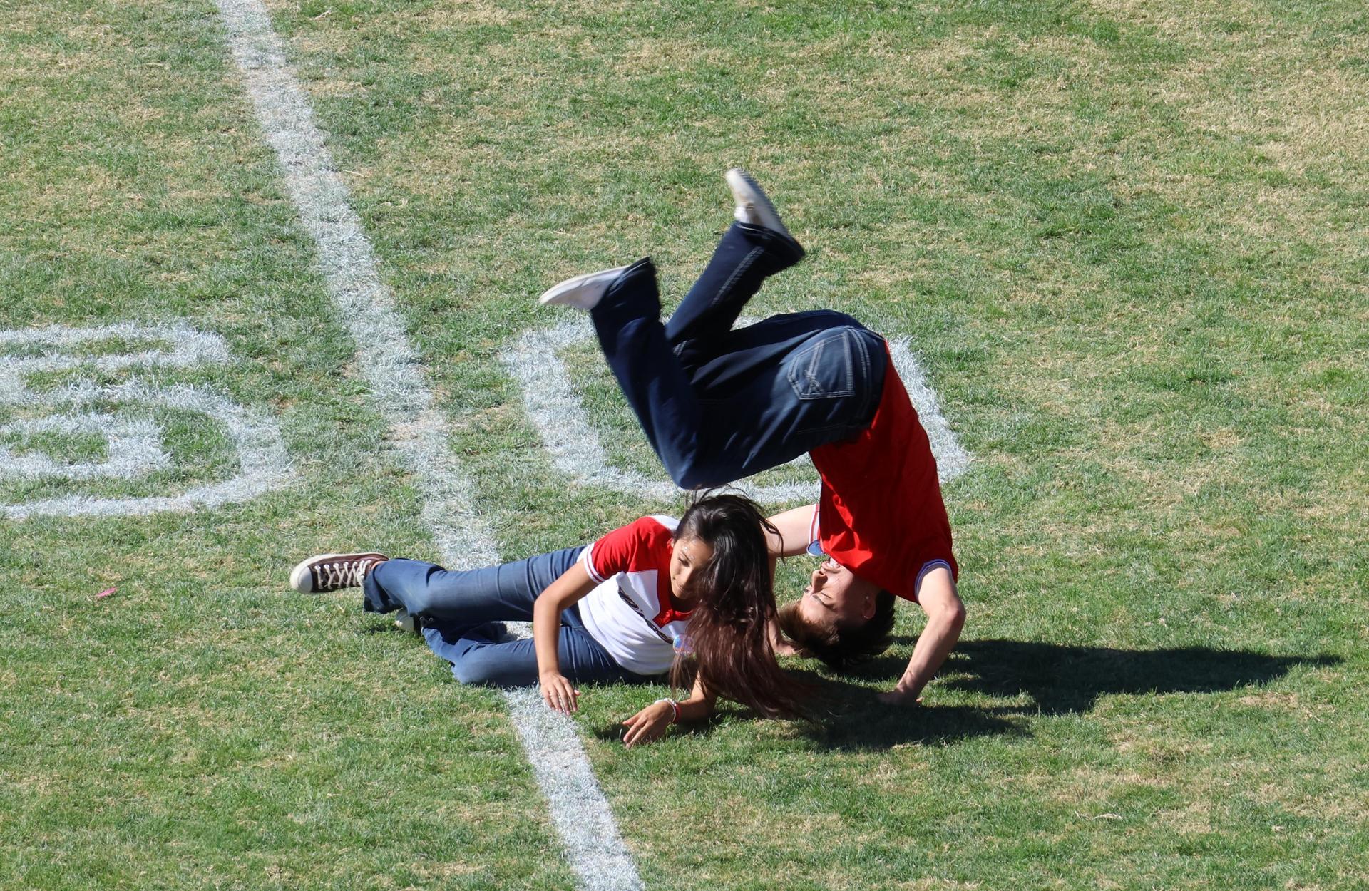 students and staff at the homecoming rally