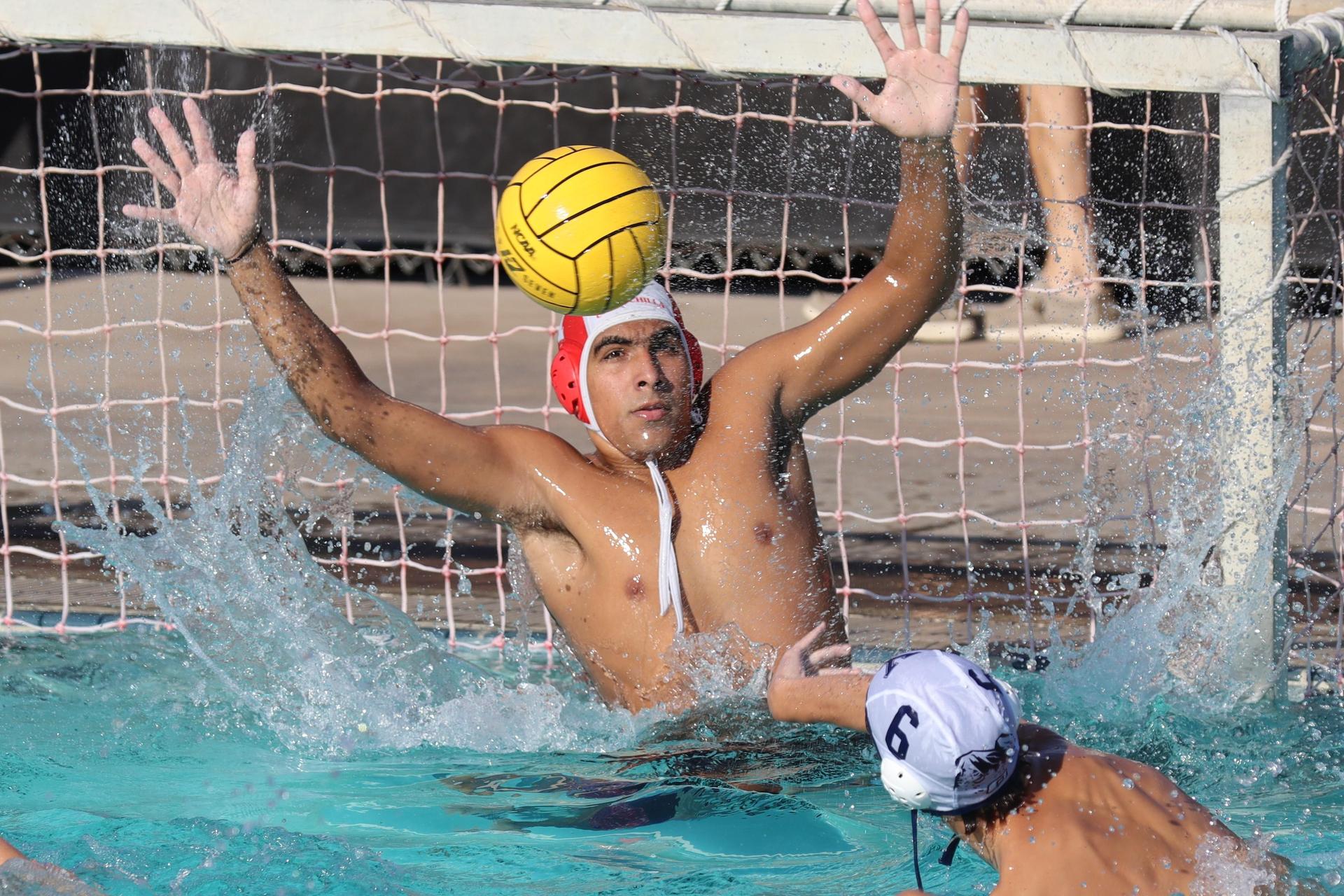 Boys playing water polo against Yosemite