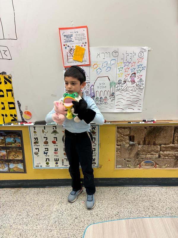 A boy shows his costume