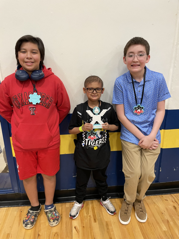 FMS GEAR team posing with their Programming Award trophy