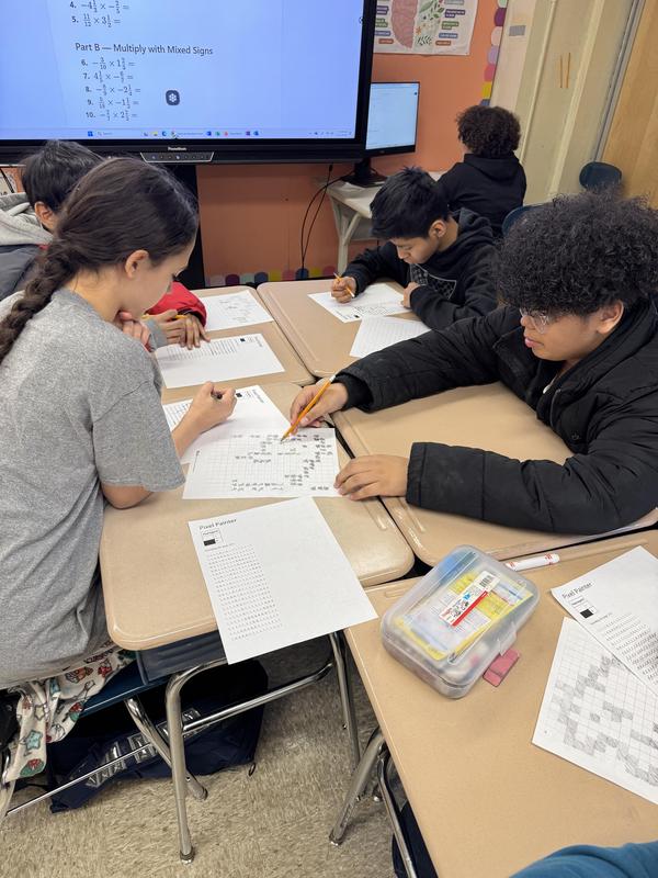 Students working on binary codes