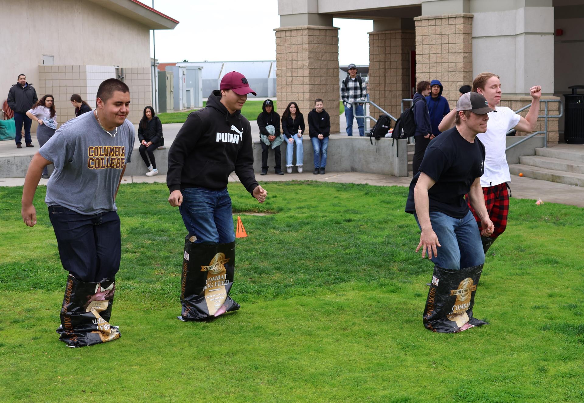students and staff enjoying the feed bag relay