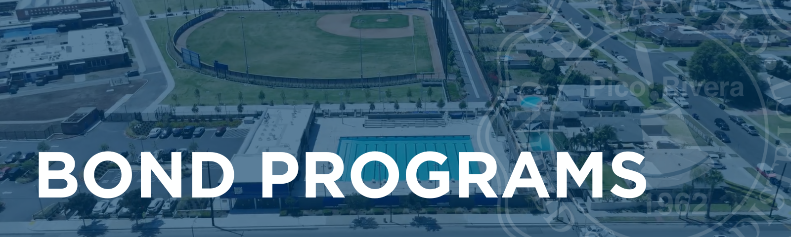 Bond program banner with aerial image of ERHS pool and baseball field