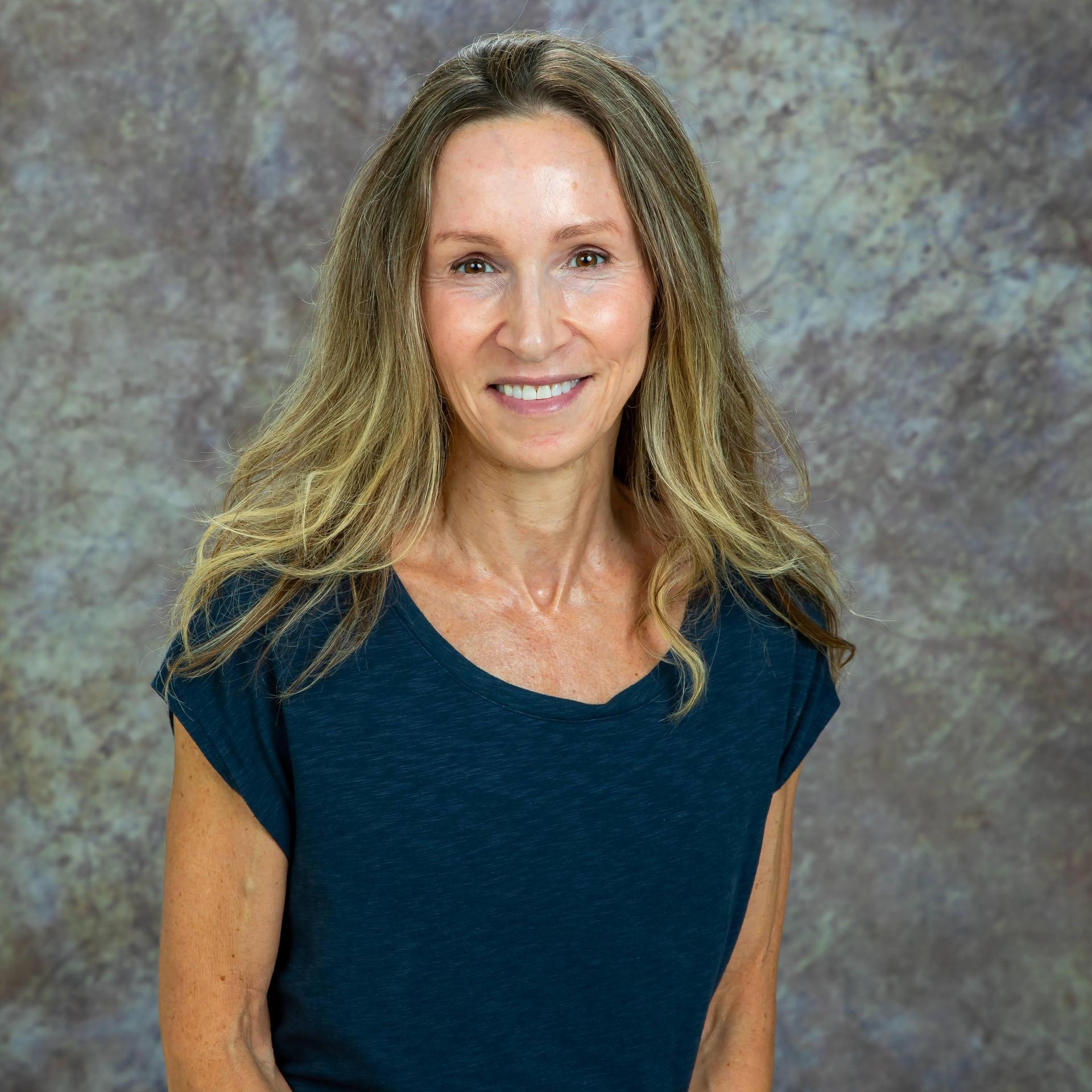 smiling woman with long hair