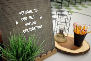 Buchanan Elementary students share writing with adults.