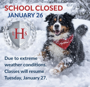 LHS comfort dog is playing in the snow, school closed January 26.