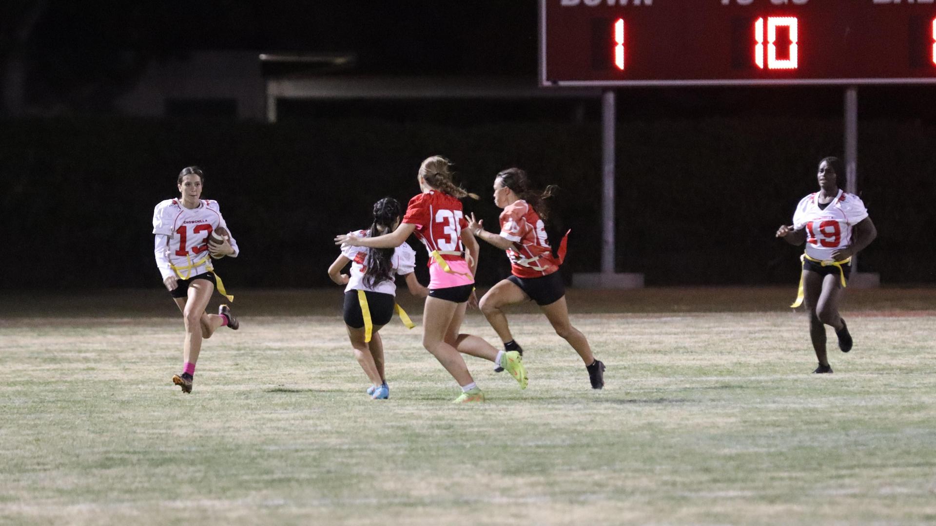 girls playing flag football