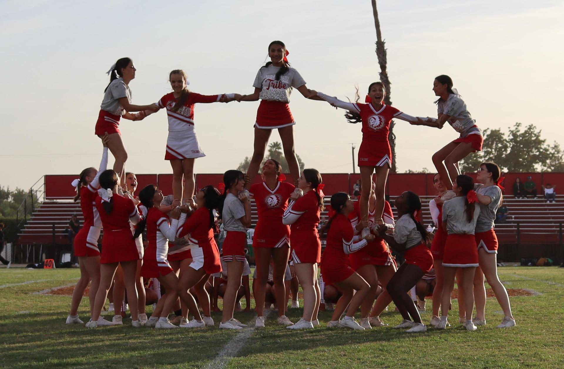 Combined cheer performing at halftime of the football game