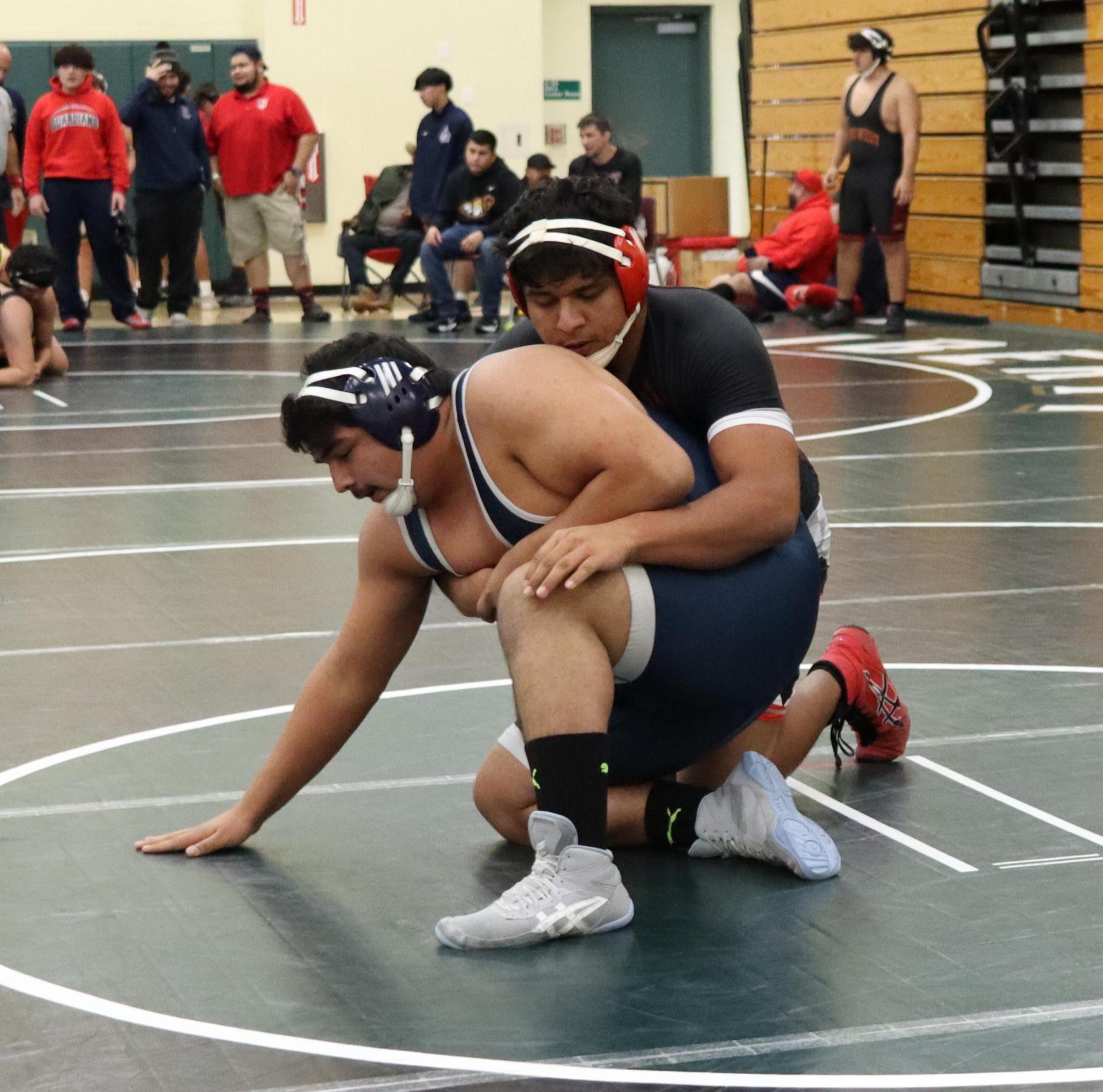 wrestlers in action at the Hawks invitational