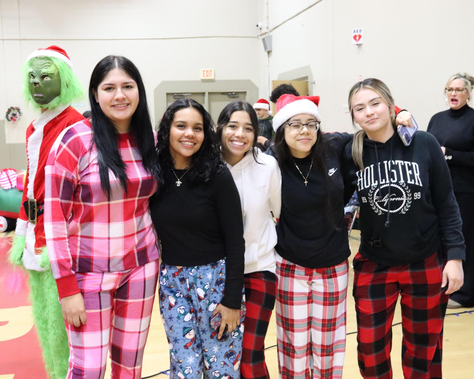 students and staff posing at the winter wishes rally