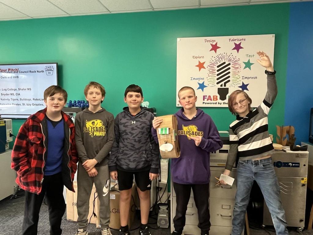 Group photo of five FABLab students.