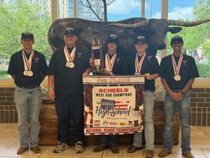 THS BBQ Team poses with fifth place trophy at National Cookoff