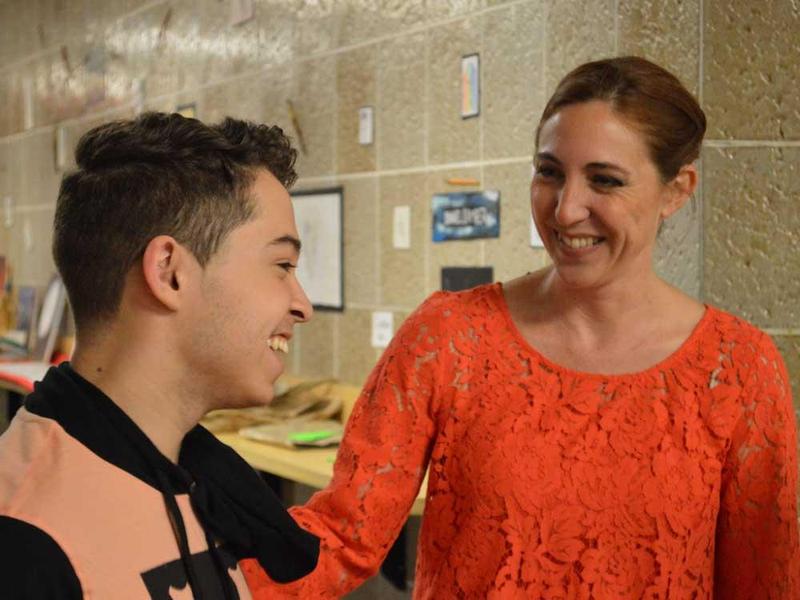 smiling teacher & student