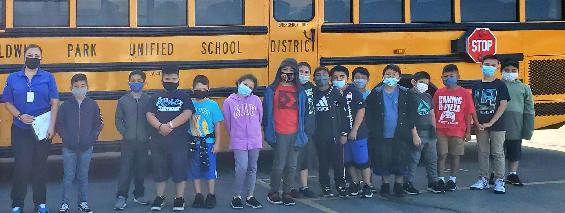 Rm 28 pic in front of school bus