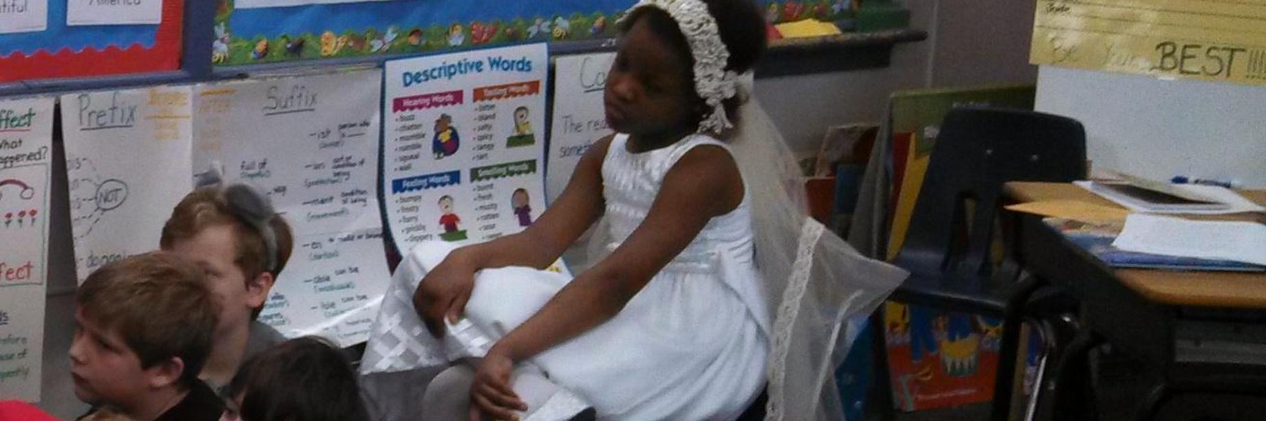Second graders being read to