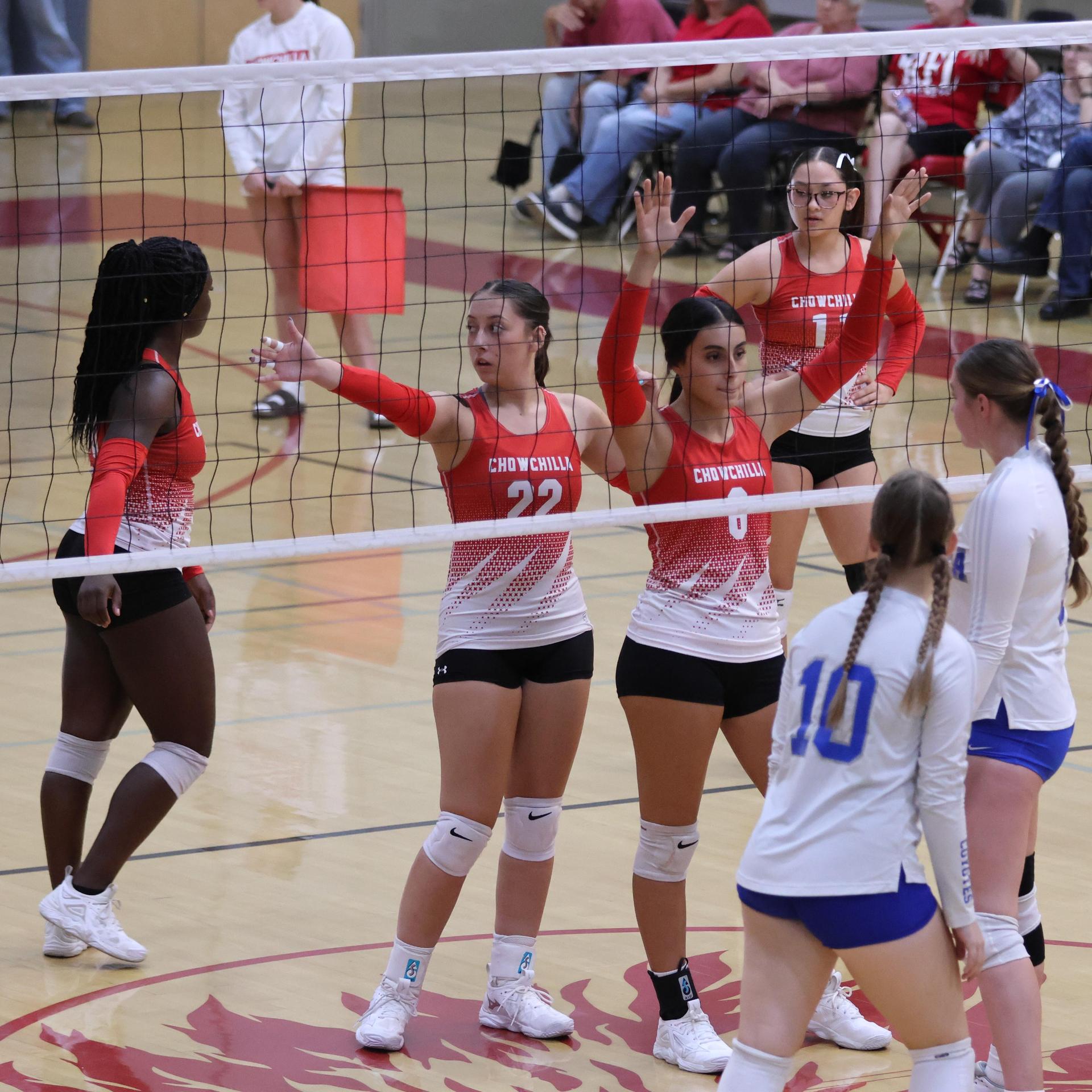 Varsity girls Volleyball playing vs. Madera 21